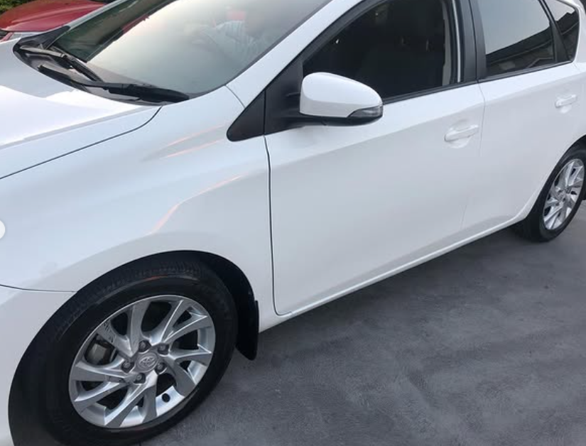 White hatchback door and quarter panel after repair and refinish at Elite Collision Centre